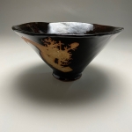 Bowl for the sale glazed in glossy black (left)