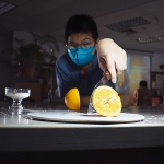 Fast Shutter Speed: Orangle Slices with Knife