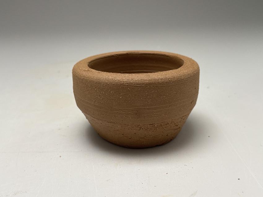 Throwing on the potters wheel